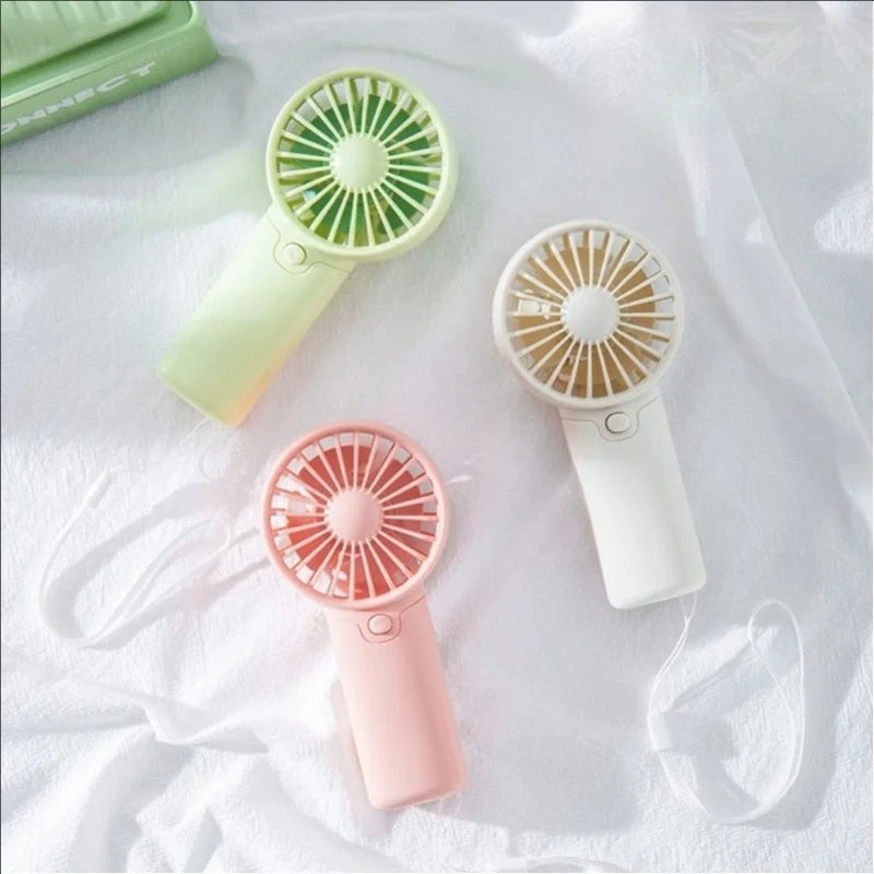 Portable Small Fan Pocket Hand-Held Lightweight AA Battery Handheld Mini Fan Air Coolers